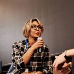 Networking Conference - Woman talking to a Man using Mic