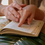 Speed Reading - A young couple are reading a book. students studying botany