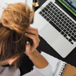 Technology Learning - Woman Sitting in Front of Macbook
