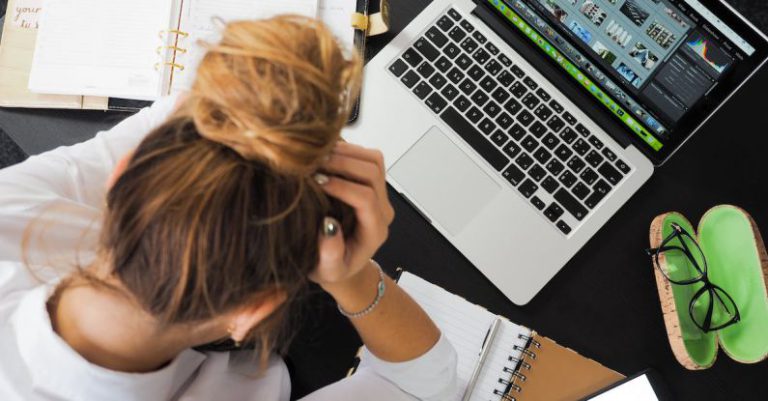 Technology Learning - Woman Sitting in Front of Macbook