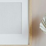 Minimalism Concept - Scandinavian room interior with mockup photo frame and vase