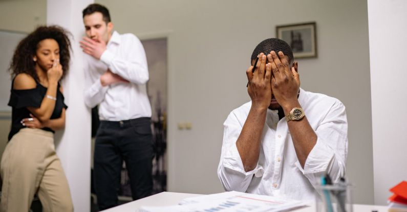 Teamwork Concept - Man in White Dress Shirt Covering His Face