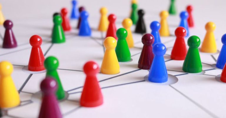 Legacy Leadership - Close Up Photography of Yellow Green Red and Brown Plastic Cones on White Lined Surface