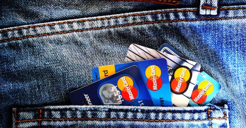 Credit Score - Blue Master Card on Denim Pocket