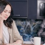 Family Finances - Stressed Woman Looking at Documents