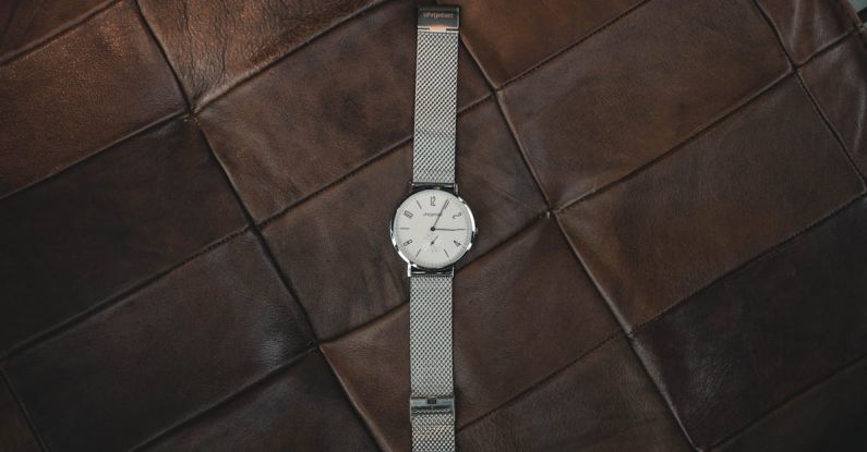 Personal Time - Round Silver-colored Watch on Table