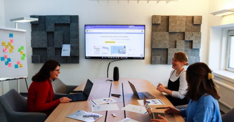 Brainstorming Session - Three women having a marketing meeting at the office