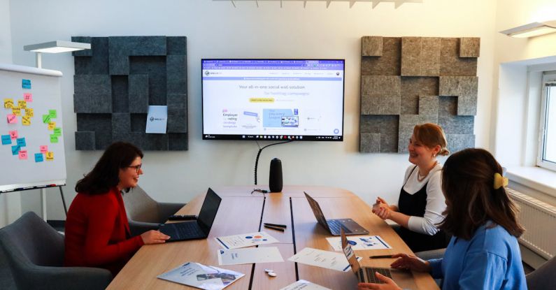 Brainstorming Session - Three women having a marketing meeting at the office