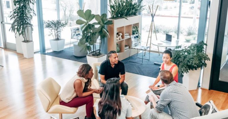 Diversity Innovation - People Sitting on Chairs Inside Room