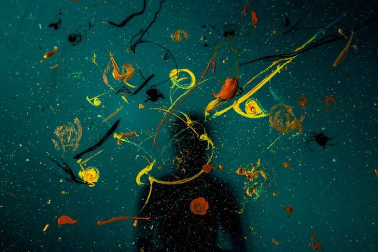 Creativity - green and yellow fish on water