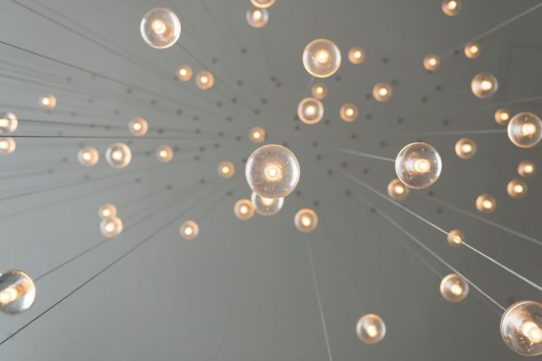 Inovation - low angle photography of drop lights