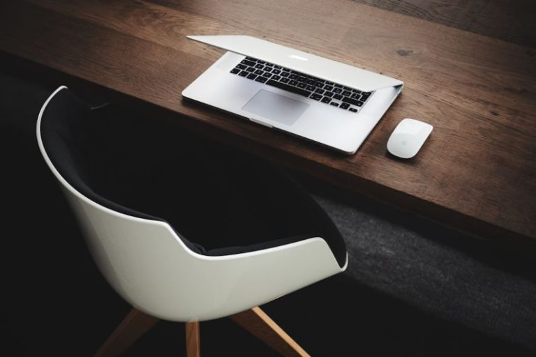 Networking Work - Apple MacBook beside computer mouse on table