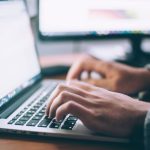 Networking Work - person using MacBook Pro