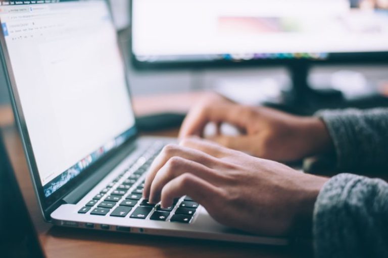 Networking Work - person using MacBook Pro