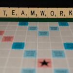 Leadership - black and brown checkered textile