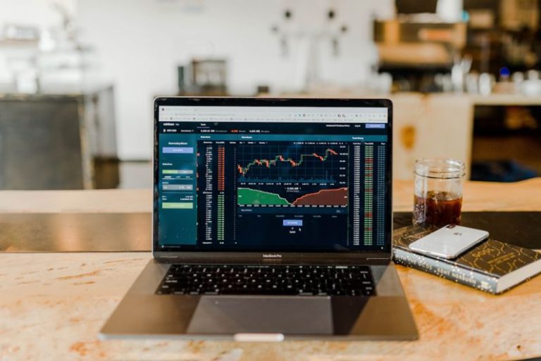 Financial Stability - turned-on MacBook Pro