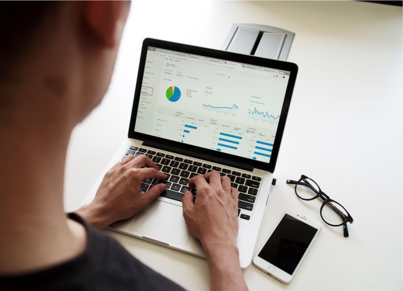 Financial Stability - person using MacBook Pro