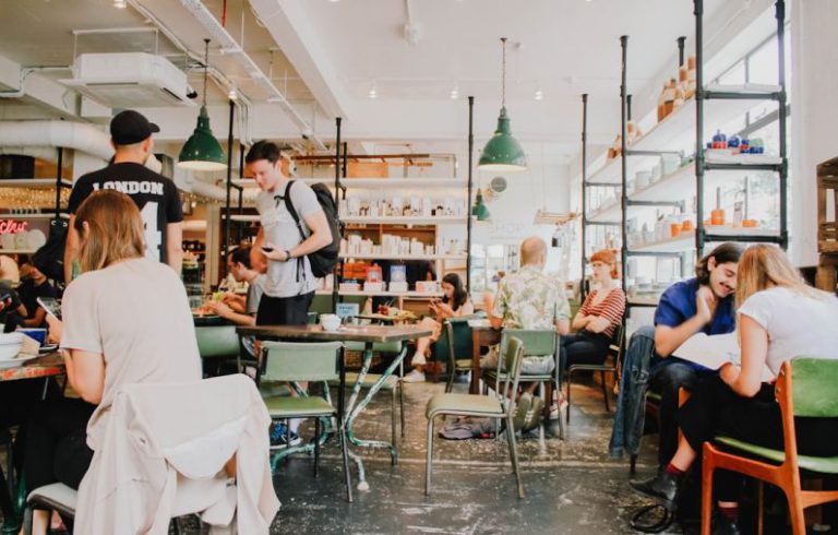 Entrepreneurship - people eating inside of cafeteria during daytime
