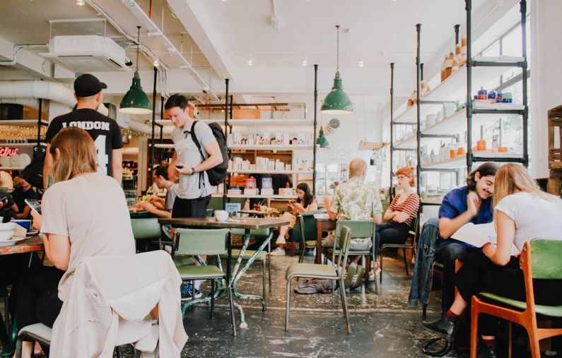 Entrepreneurship - people eating inside of cafeteria during daytime