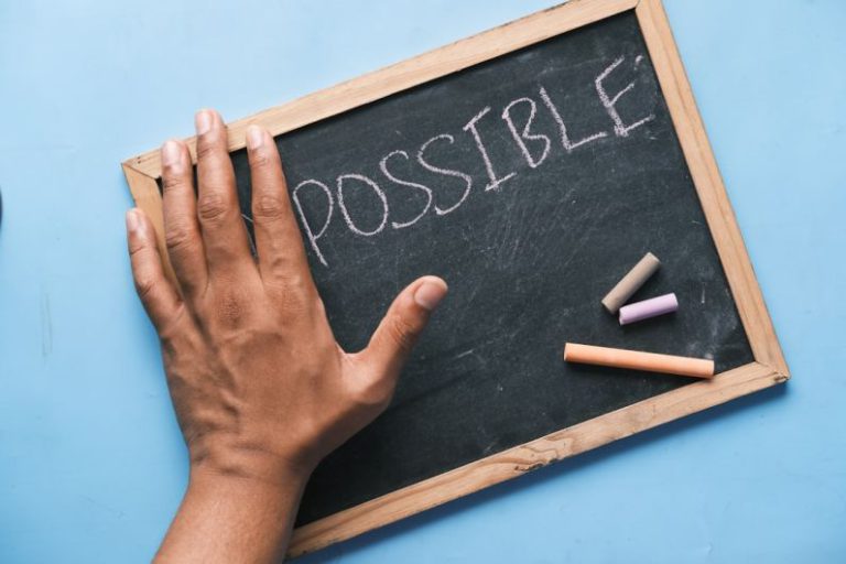 Personal Development - a chalkboard with the word possible written on it