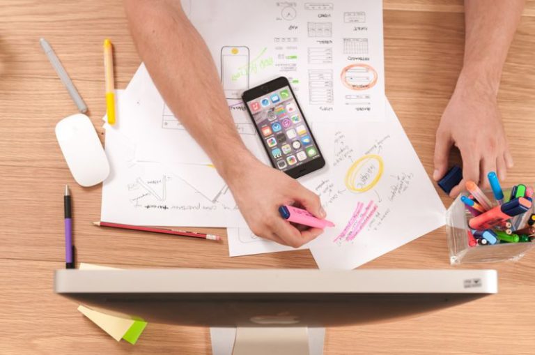 Time Management - person writing on white paper